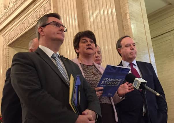 DUP leader Arlene Foster speaks to the media alongside party colleagues at Great Hall Parliament Buildings, Belfast. Picture: David Young/PA Wire