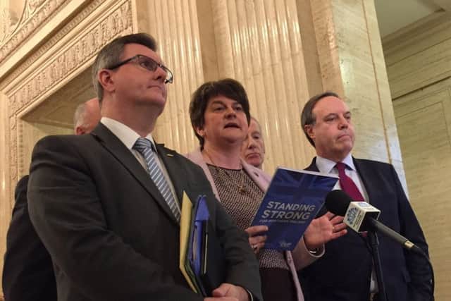 DUP leader Arlene Foster speaks to the media alongside party colleagues at Great Hall Parliament Buildings, Belfast. Picture: David Young/PA Wire