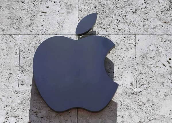 Apple has issued an apology after admitting slowing down older iPhone handsets (AP Photo/Alan Diaz, File)