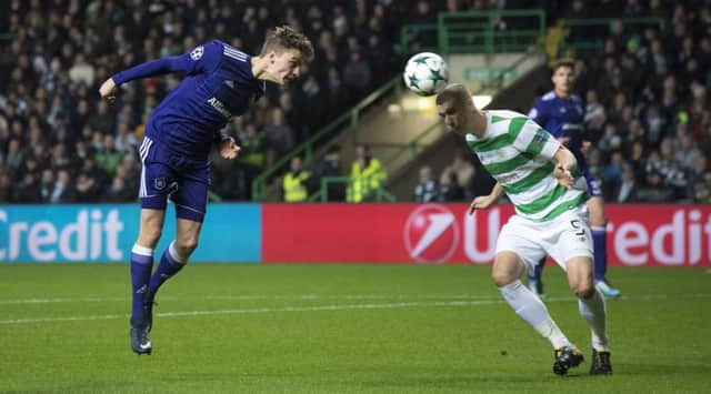Celtic's Jozo Simunovic (right) deflects the ball into his own net to give Anderlecht the lead. Picture: SNS