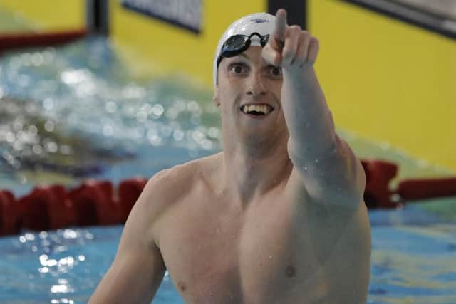 Dan Wallace celebrates his gold in the men's 400m individual medley at the 2014 Commonwealth Games. Picture: Andy O'Brien