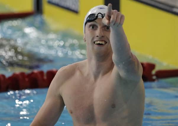 Dan Wallace celebrates his gold in the men's 400m individual medley at the 2014 Commonwealth Games. Picture: Andy O'Brien
