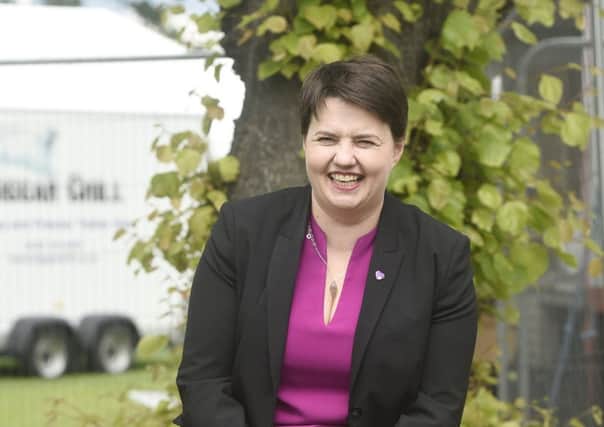 Magnetic Ruth Davidson brings something else to the political table, argues Jim Duffy, in contrast to the greyness of  her partys UK leader and prime minister Theresa May. Picture: Greg Macvean