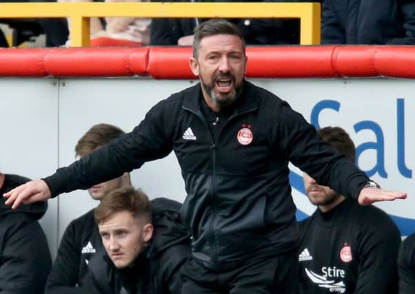 Aberdeen manager Derek McInnes is wanted by Rangers. Picture: PA