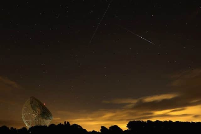 A Perseid meteor over the Lovell Radio Telescope at Jodrell Bank in 2013. Picture: Getty