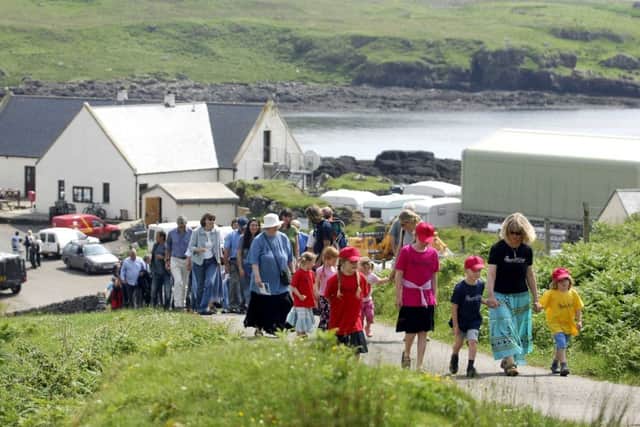 Residents on Eigg mark the 10th anniversary of their community buyout. The island, one of the Small Isles near Skye, was bought by a community trust for 1.5 million in 1997. Picture: Jane Barlow/TSPL