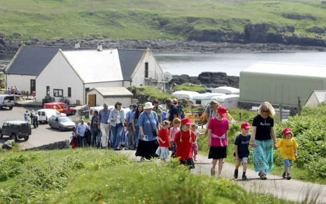 Residents on Eigg mark the 10th anniversary of their community buyout. The island, one of the Small Isles near Skye, was bought by a community trust for 1.5 million in 1997. Picture: Jane Barlow/TSPL
