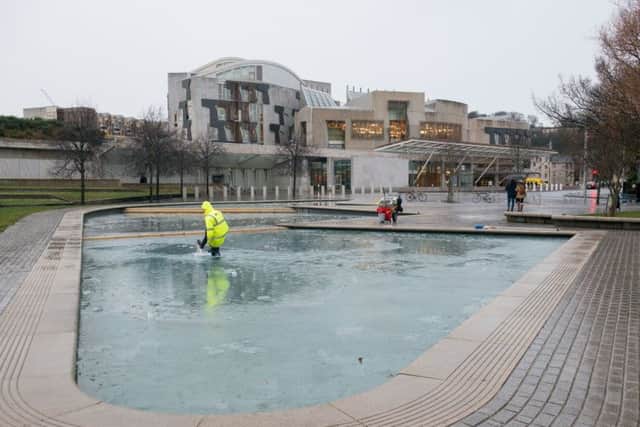 The ponds at Holyrood are frozen  just like the  amount of money being given to local authorities in the budget. Picture: Ian Georgeson