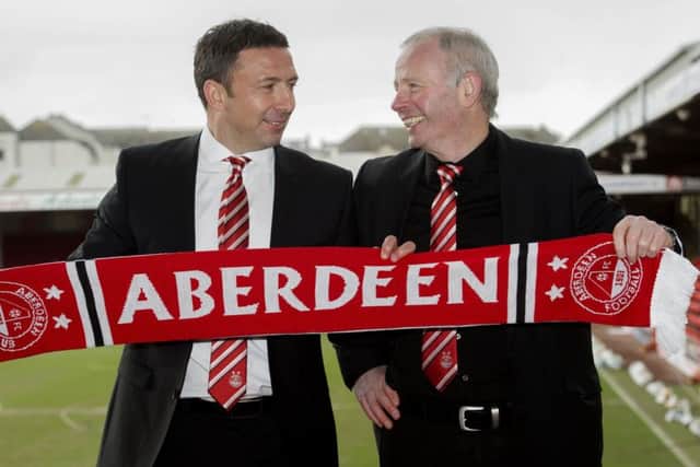Derek McInnes, left and Aberdeen chairman Stewart Milne were all smiles when the former St Johnstone and Bristol City boss took over as Pittodrie manager in March 2013. Picture: Bill Murray/SNS