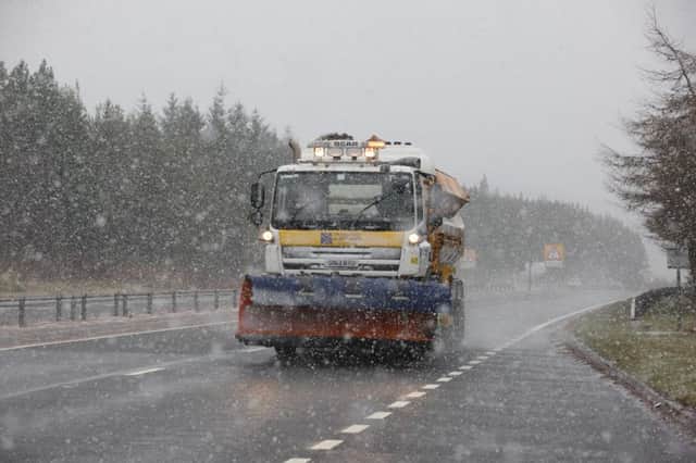 A snowplough on the A9 near Inverness where blizzards have been blown by 90mph winds. Picture: Peter Jolly