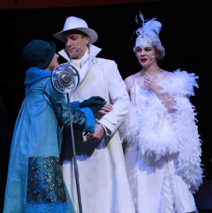 Singin' in the Rain at Pitlochry Festival Theatre starred Grant Neal as Don, George Rae as Cosmo, and Mari McGinlay as Kathy who shone in the set pieces