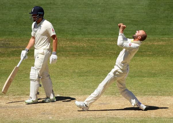 Australia off-spinner Nathan Lyon celebrates after dismissing England's Moeen Ali at the Adelaide Oval. Photograph: Cameron Spencer/Getty