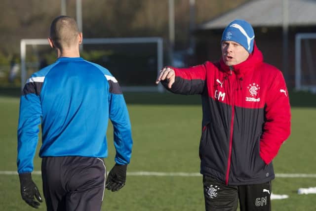 Rangers interim manager Graeme Murty with striker Kenny Miller at training. Picture: Craig Foy/SNS