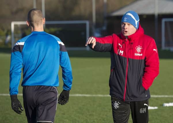 Rangers interim manager Graeme Murty with striker Kenny Miller at training. Picture: Craig Foy/SNS