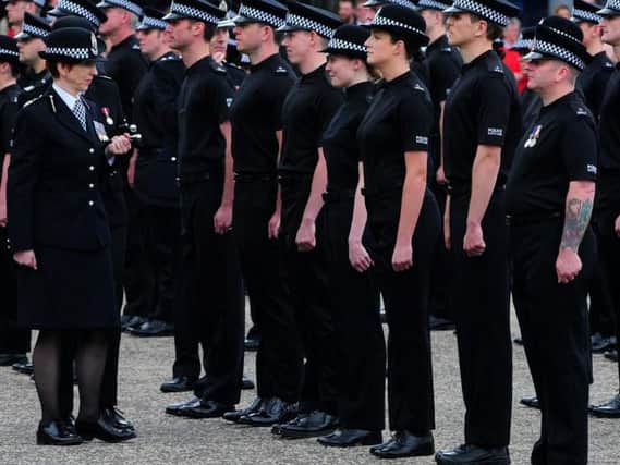 Deputy Chief Constable Rose Fitzpatrick inspects the new officers joining Police Scotland (Picture: SWNS)