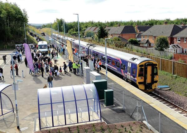 Passengers board a train at Newtongrange as the new service begins in 2015. Photograph: Andrew OBrien