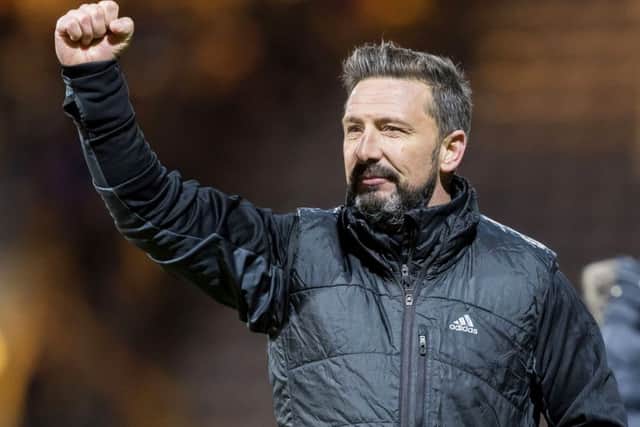 Aberdeen manager Derek McInnes acnowledges the travelling fans at full time. Picture: Roddy Scott/SNS