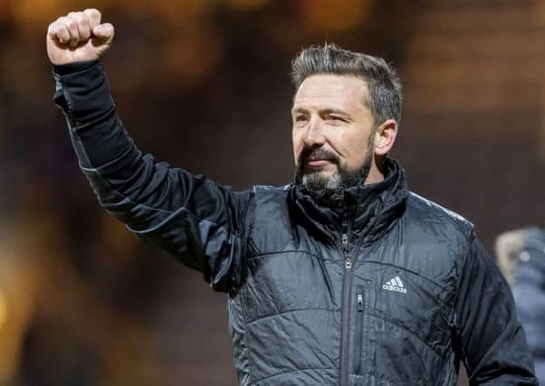 Aberdeen manager Derek McInnes acnowledges the travelling fans at full time. Picture: Roddy Scott/SNS