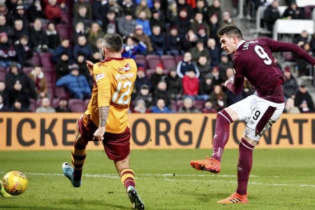 Hearts' Kyle Lafferty fires towards goal. Picture: SNS