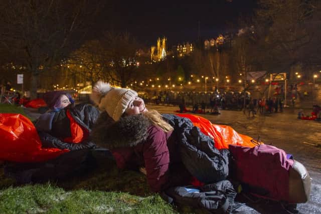 Two girls get ready into their sleeping bags for Sleep in the Park,Pic: Ian Rutherford