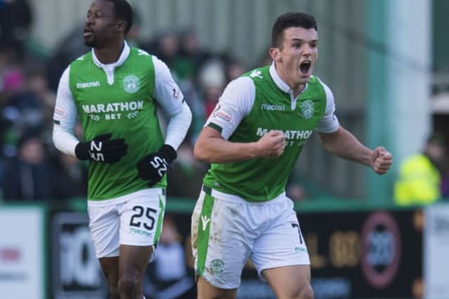 John McGinn shouts encouragement to his team-mates after Hibs pull a goal back at 2-1. Picture: SNS
