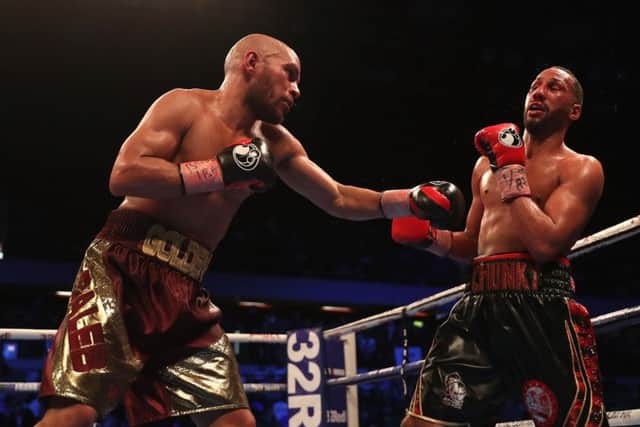 American Caleb Truax, left, lands a punch on his way to defeating Britain's James DeGale. Picture: Christopher Lee/Getty