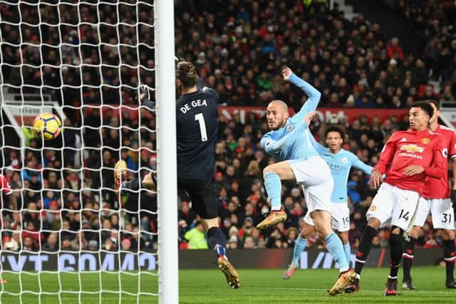 David Silva swivels to fire the ball beyond David de Gea for Manchester City's opening goal. Picture: Michael Regan/Getty