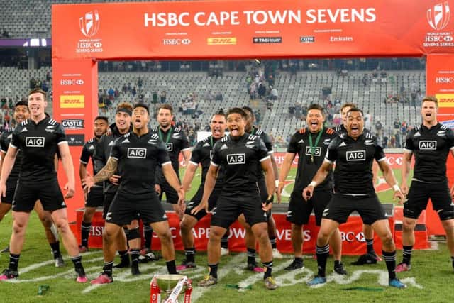 Clark Laidlaw's New Zealand celebrate after winning the World Rugby Sevens Series at Cape Town. Picture: Rodger Bosch/AFP/Getty Images