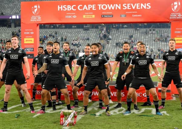 Clark Laidlaw's New Zealand celebrate after winning the World Rugby Sevens Series at Cape Town. Picture: Rodger Bosch/AFP/Getty Images