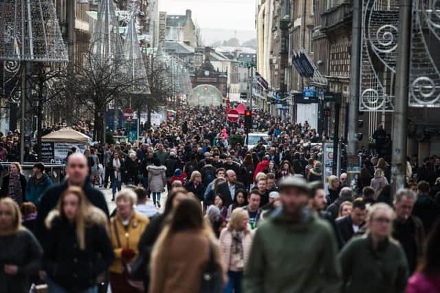Shoppers in Buchanan Street, Glasgow. A charity is calling for donations to support refugees in the city. Picture: John Devlin