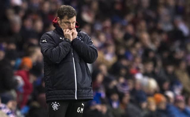 Graeme Murty watches on as Rangers battle to victory over Ross County. Picture: SNS