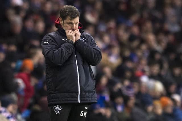 Graeme Murty watches on as Rangers battle to victory over Ross County. Picture: SNS