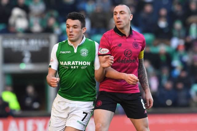 John McGinn battles with Celtic's Scott Brown in the 2-2 draw at Easter Road. Picture: SNS Group