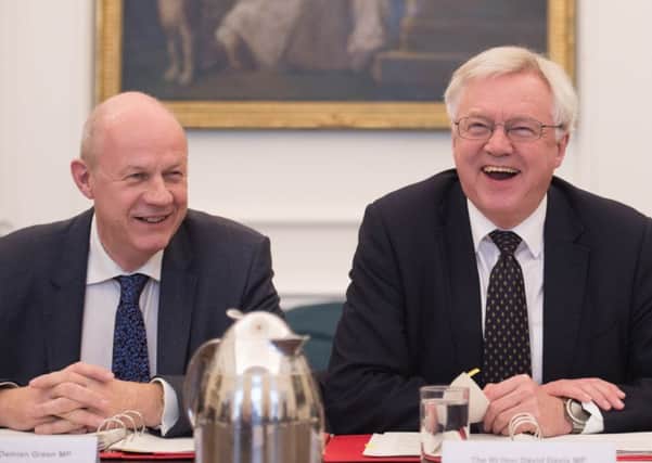Brexit Secretary David Davis (right) and First Secretary of State Damian Green (left) discuss plans to leave the EU. Picture: Stefan Rousseau/PA Wire