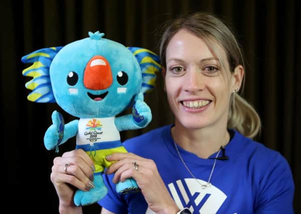 800m hurdler Eilidh Doyle with the Gold Coast Commonwealth Games mascot. Picture: Jane Barlow/PA Wire