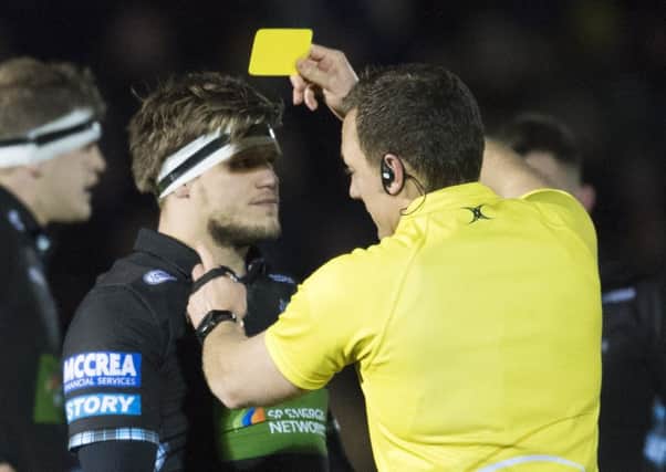 Glasgow Warriors' George Turner is shown a yellow card against Montpellier. Picture: SNS
