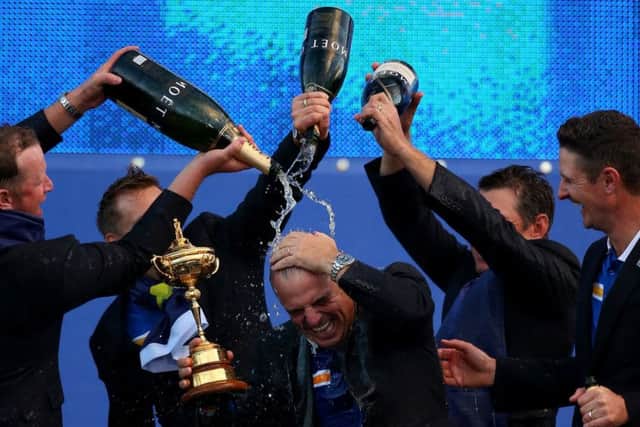 Team captain Paul McGinley is showered with champagne after leading Europe to Ryder Cup victory in the biennial event at Gleneagles in  2014.
