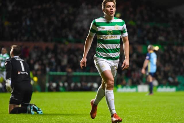 James Forrest celebrates after he makes it 2-1 to Celtic. Picture: SNS