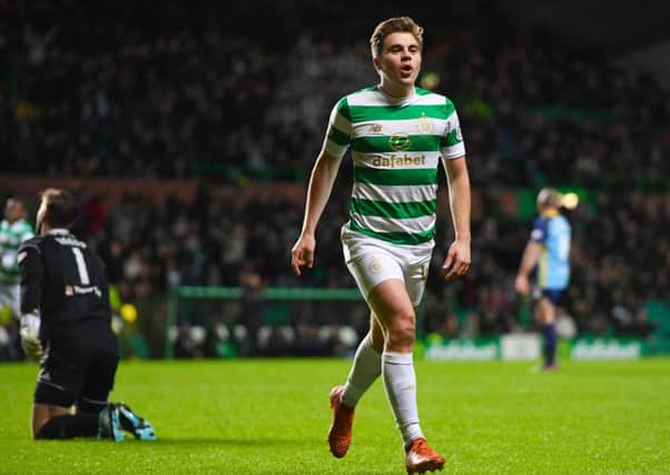 James Forrest celebrates after he makes it 2-1 to Celtic. Picture: SNS