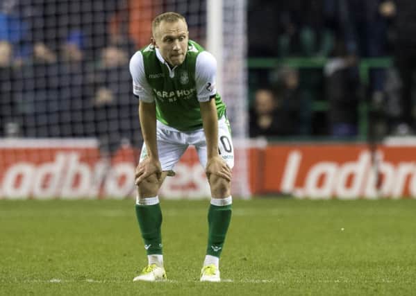Dejection for Hibernian's Dylan McGeouch at full-time. Picture: SNS