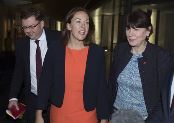 Former Labour leader Kezia Dugdale faced questions after arriving home in Scotland. Picture: SWNS
