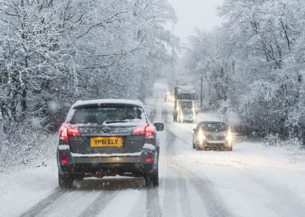 Snow and ice could cause travel disruption across the west of Scotland this morning. Picture: TSPL