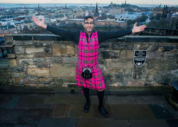 Scottish Comedian and Street Party Host Sanjeev Kohli models the new tartan. Picture: Ian Georgeson