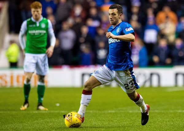 Jason Holt drives forward for Rangers at Easter Road last night. Picture: SNS Group