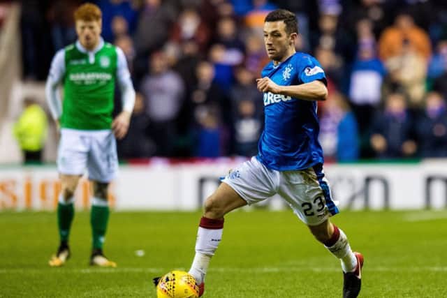 Jason Holt drives forward for Rangers at Easter Road last night. Picture: SNS Group