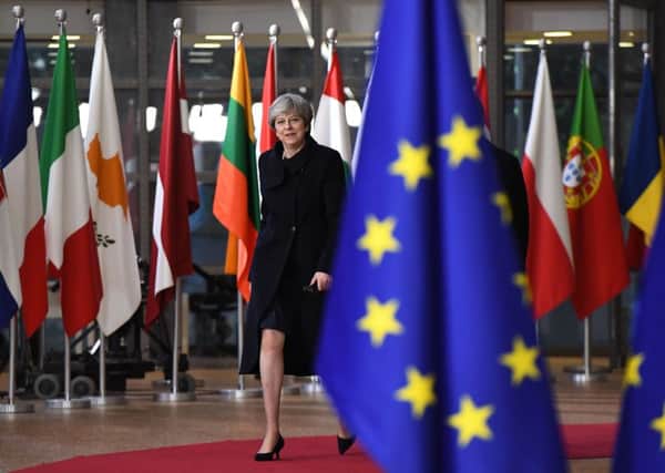 Prime minister Theresa May arrives to attend the first day of a European union summit in Brussels. Picture: AFP/Getty Images