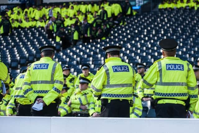 Stock photograph of police officers attending a pre-match briefing at Hampden Park. Picture: John Devlin