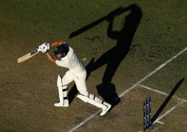 England batsman Dawid Malan plays a stroke on his way to an unbeaten 110 on day one of the third Test. Picture: Paul Kane/Getty
