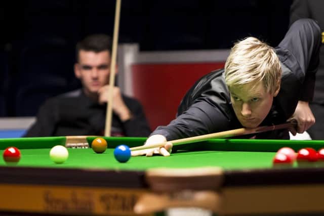 Wishaws Chris Totten is forced to watch as former world champion Neil Robertson of Australia closes out their match in Glasgow. Picture: Bruce White/SNS