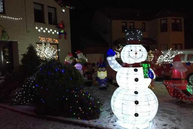 17 houses in the street take part in the festive fundraiser. PIC: Contributed.